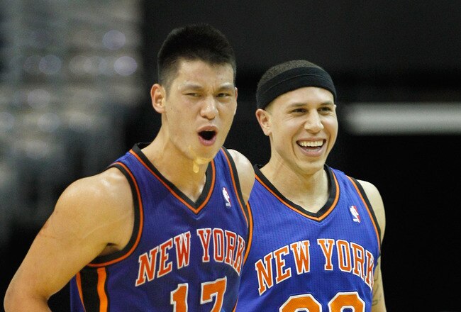 WASHINGTON, DC - FEBRUARY 08: Jeremy Lin #17 of the New York Knicks and Mike Bibby #20 celebrate after Lin scored against the Washington Wizards during the second half at Verizon Center on February 8, 2012 in Washington, DC. NOTE TO USER: User expressly acknowledges and agrees that, by downloading and or using this photograph, User is consenting to the terms and conditions of the Getty Images License Agreement.  (Photo by Rob Carr/Getty Images)