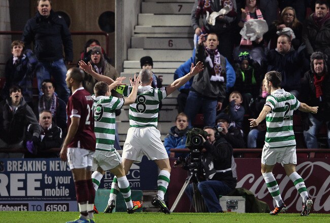 EDINBURGH, SCOTLAND - FEBRUARY 08: Scott Brown of Celtic celebrates after scoring a goal during the Scottish Clydesdale Bank Premier League match between Hearts and Celtic at Tynecastle Park on February 8, 2012 in Edinburgh, Scotland.  (Photo by Jeff J Mitchell/Getty Images)