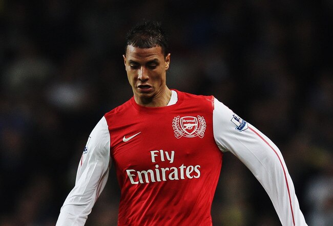 LONDON, ENGLAND - JANUARY 09:  Marouane Chamakh of Arsenal runs with the ball during the FA Cup Third Round match between Arsenal and Leeds United at the Emirates Stadium on January 9, 2012 in London, England.  (Photo by Clive Mason/Getty Images)