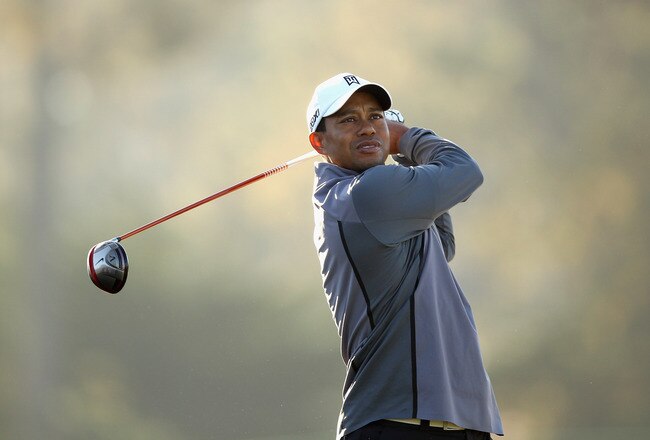 PEBBLE BEACH, CA - FEBRUARY 08:  Tiger Woods hits a tee shot during a practice round for the AT&T Pebble Beach National Pro-Am at the Monterey Peninsula Country Club on February 8, 2012 in Pebble Beach, California.  (Photo by Ezra Shaw/Getty Images)
