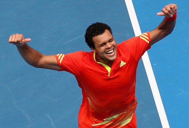 MELBOURNE, AUSTRALIA - JANUARY 21:  Jo-Wilfred Tsonga of France celebrates winning his third round match against Frederico Gil of Portugal during day six of the 2012 Australian Open at Melbourne Park on January 21, 2012 in Melbourne, Australia.  (Photo by Ryan Pierse/Getty Images)