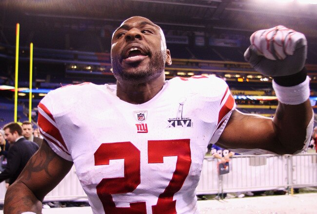 INDIANAPOLIS, IN - FEBRUARY 05:  Brandon Jacobs #27 of the New York Giants leaves the field after the Giants defeated the Patriots by a score of 21-17 in Super Bowl XLVI at Lucas Oil Stadium on February 5, 2012 in Indianapolis, Indiana.  (Photo by Elsa/Getty Images)