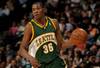 DENVER - MARCH 16:  Kevin Durant #35 of the Seattle SuperSonics controls the ball against the Denver Nuggets at the Pepsi Center on March 16, 2008 in Denver, Colorado. The Nuggets defeated the Sonics 168-116. NOTE TO USER: User expressly acknowledges and agrees that, by downloading and or using this photograph, user is consenting to the term and conditions of the Getty Images License Agreement.  (Photo by Doug Pensinger/Getty Images)