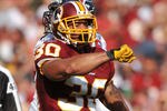 LANDOVER, MD - SEPTEMBER 19:  LaRon Landry #30 of the Washington Redskins celebrates a play against the Houston Texans at FedExField on September 19, 2010 in Landover, Maryland. The Texans defeated the Redskins in overtime 30-27. (Photo by Larry French/Getty Images)