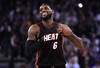 OAKLAND, CA - JANUARY 10:  LeBron James #6 of the Miami Heat smiles during their game against the Golden State Warriors at Oracle Arena on January 10, 2012 in Oakland, California.  NOTE TO USER: User expressly acknowledges and agrees that, by downloading and or using this photograph, User is consenting to the terms and conditions of the Getty Images License Agreement.  (Photo by Ezra Shaw/Getty Images)