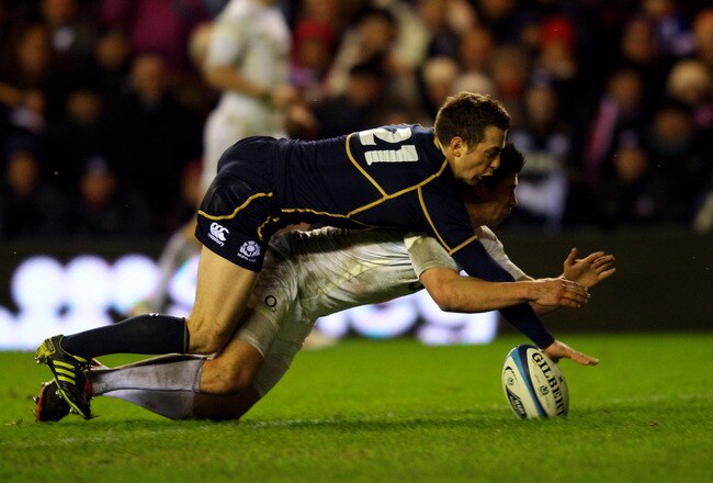 EDINBURGH, SCOTLAND - FEBRUARY 04:  Greig Laidlaw of Scotland appears to touch down the ball for a try ahead of Ben Youngs of England, but is is ruled out after a review by the Third Match Official during the RBS Six Nations match between Scotland and England at Murrayfield Stadium on February 4, 2012 in Edinburgh, Scotland.  (Photo by David Rogers/Getty Images)