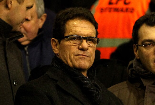 LIVERPOOL, ENGLAND - FEBRUARY 06:  England Manager Fabio Capello chats to Liverpool Director of Football Damien Comolli (R) prior to the Barclays Premier League match between Liverpool and Tottenham Hotspur at Anfield on February 6, 2012 in Liverpool, England. (Photo by Clive Brunskill/Getty Images)