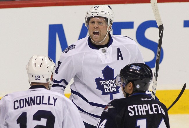 WINNIPEG, CANADA - DECEMBER 31: Phil Kessel #81 of the Toronto Maple Leafs reacts to his goal against the Winnipeg Jets in NHL action at the MTS Centre on December 31, 2011 in Winnipeg, Manitoba, Canada. (Photo by Marianne Helm/Getty Images)