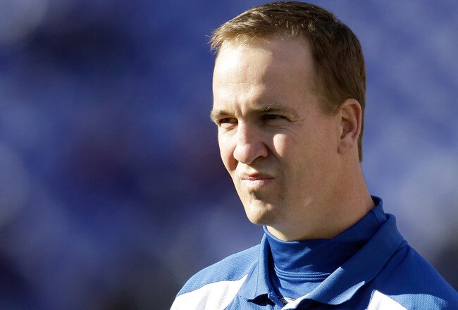 BALTIMORE, MD - DECEMBER 11:  Peyton Manning #18 of the Indianapolis Colts watches as the Colts warm up before the start of their game against the Baltimore Ravens at M&T Bank Stadium on December 11, 2011 in Baltimore, Maryland.  (Photo by Rob Carr/Getty Images)