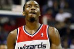 WASHINGTON, DC - FEBRUARY 08: John Wall #2 of the Washington Wizards walks on the court after colliding with Jeremy Lin #17 of the New York Knicks (not pictured) during the first half at Verizon Center on February 8, 2012 in Washington, DC.  NOTE TO USER: User expressly acknowledges and agrees that, by downloading and or using this photograph, User is consenting to the terms and conditions of the Getty Images License Agreement.  (Photo by Rob Carr/Getty Images)