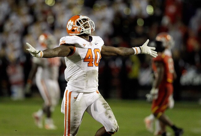 COLLEGE PARK, MD - OCTOBER 15: Defensive end Andre Branch #40 of the Clemson Tigers celebrates during the closing moments of the Tigers' 56-45 win over the Maryland Terrapins at Byrd Stadium on October 15, 2011 in College Park, Maryland.  (Photo by Rob Carr/Getty Images)