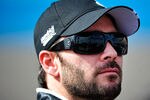 AVONDALE, AZ - NOVEMBER 12:  Jimmie Johnson, driver of the #48 Lowe's/Kobalt Tools Chevrolet, looks on during qualifying for the NASCAR Sprint Cup Series Kobalt Tools 500 at Phoenix International Raceway on November 12, 2011 in Avondale, Arizona.  (Photo by Rainier Ehrhardt/Getty Images for NASCAR)