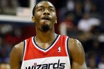 WASHINGTON, DC - FEBRUARY 08: John Wall #2 of the Washington Wizards walks on the court after colliding with Jeremy Lin #17 of the New York Knicks (not pictured) during the first half at Verizon Center on February 8, 2012 in Washington, DC.  NOTE TO USER: User expressly acknowledges and agrees that, by downloading and or using this photograph, User is consenting to the terms and conditions of the Getty Images License Agreement.  (Photo by Rob Carr/Getty Images)