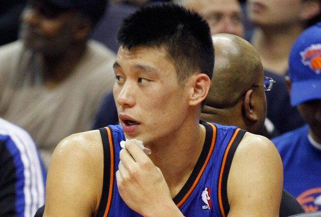 WASHINGTON, DC - FEBRUARY 08: Jeremy Lin #17 of the New York Knicks sits on the bench after colliding with John Wall #2 of the Washington Wizards (not pictured) during the first half at Verizon Center on February 8, 2012 in Washington, DC.  NOTE TO USER: User expressly acknowledges and agrees that, by downloading and or using this photograph, User is consenting to the terms and conditions of the Getty Images License Agreement. (Photo by Rob Carr/Getty Images)