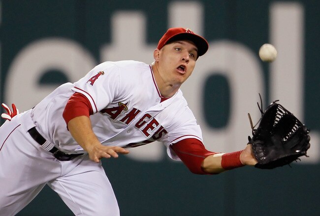 ANAHEIM, CA - SEPTEMBER 26:  Mike Trout #27 of the Los Angeles Angels of Anaheim makes a catch on a ball hit by Mike Napoli (not pictured) of the Texas Rangers in the eighth inning at Angel Stadium of Anaheim on September 26, 2011 in Anaheim, California.  (Photo by Jeff Gross/Getty Images)