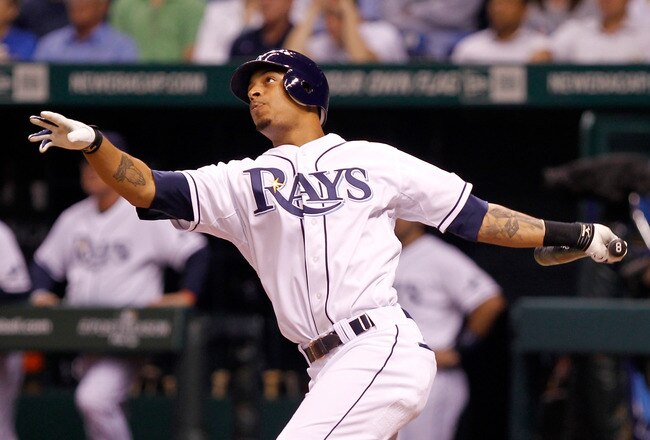 ST PETERSBURG, FL - OCTOBER 03:  Desmond Jennings #8 of the Tampa Bay Rays hits a solo home run in the eighth inning against Mike Adams #37 of the Texas Rangers in Game Three of the American League Division Series at Tropicana Field on October 3, 2011 in St Petersburg, Florida.  (Photo by Mike Ehrmann/Getty Images)