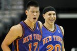 WASHINGTON, DC - FEBRUARY 08: Jeremy Lin #17 of the New York Knicks and Mike Bibby #20 celebrate after Lin scored against the Washington Wizards during the second half at Verizon Center on February 8, 2012 in Washington, DC. NOTE TO USER: User expressly acknowledges and agrees that, by downloading and or using this photograph, User is consenting to the terms and conditions of the Getty Images License Agreement.  (Photo by Rob Carr/Getty Images)