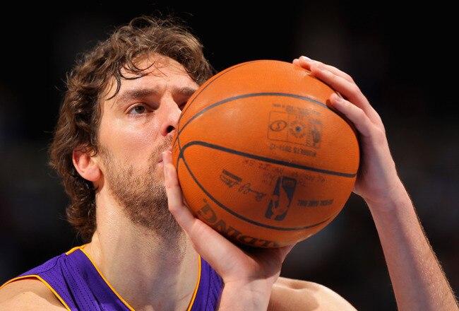 DENVER, CO - FEBRUARY 03:  Pau Gasol #16 of the Los Angeles Lakers takes a free throw against the Denver Nuggets at the Pepsi Center on February 3, 2012 in Denver, Colorado. NOTE TO USER: User expressly acknowledges and agrees that, by downloading and or using this photograph, User is consenting to the terms and conditions of the Getty Images License Agreement.  (Photo by Doug Pensinger/Getty Images)