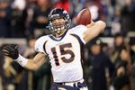 FOXBORO, MA - JANUARY 14:  Tim Tebow #15 of the Denver Broncos warms up against the New England Patriots during their AFC Divisional Playoff Game at Gillette Stadium on January 14, 2012 in Foxboro, Massachusetts.  (Photo by Jim Rogash/Getty Images)