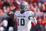 STILLWATER, OK - OCTOBER 29:  Quarterback Robert Griffin III #10 of the Baylor Bears looks to throw in the first half against the Oklahoma State Cowboys on October 29, 2011 at Boone Pickens Stadium in Stillwater, Oklahoma.  Oklahoma State defeated Baylor 59-24.  (Photo by Brett Deering/Getty Images)