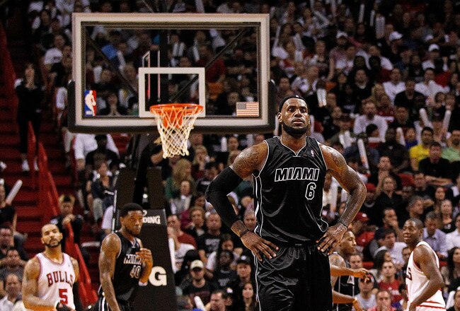 MIAMI, FL - JANUARY 29:  LeBron James #6 of the Miami Heat looks on during a game against the Chicago Bulls at American Airlines Arena on January 29, 2012 in Miami, Florida. NOTE TO USER: User expressly acknowledges and agrees that, by downloading and/or using this Photograph, User is consenting to the terms and conditions of the Getty Images License Agreement.  (Photo by Mike Ehrmann/Getty Images)