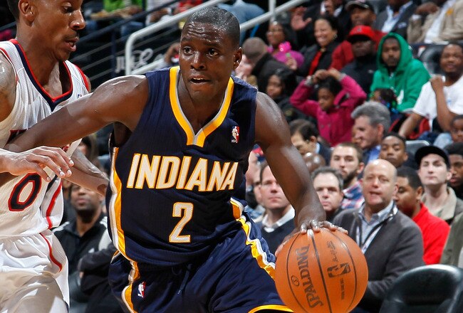 ATLANTA, GA - FEBRUARY 08:  Darren Collison #2 of the Indiana Pacers drives against Jeff Teague #0 of the Atlanta Hawks at Philips Arena on February 8, 2012 in Atlanta, Georgia.  NOTE TO USER: User expressly acknowledges and agrees that, by downloading and or using this photograph, User is consenting to the terms and conditions of the Getty Images License Agreement.  (Photo by Kevin C. Cox/Getty Images)