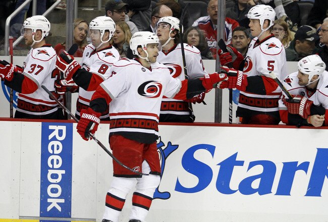 PITTSBURGH, PA - DECEMBER 27:  Tuomo Ruutu #15 of the Carolina Hurricanes celebrates his third period goal against the Pittsburgh Penguins during the game at Consol Energy Center on December 27, 2011 in Pittsburgh, Pennsylvania.  The Penguins won 4-2.  (Photo by Justin K. Aller/Getty Images)