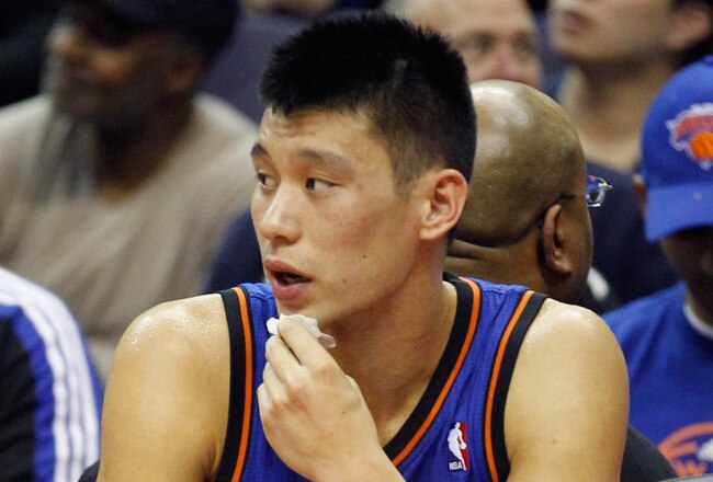 WASHINGTON, DC - FEBRUARY 08: Jeremy Lin #17 of the New York Knicks sits on the bench after colliding with John Wall #2 of the Washington Wizards (not pictured) during the first half at Verizon Center on February 8, 2012 in Washington, DC.  NOTE TO USER: User expressly acknowledges and agrees that, by downloading and or using this photograph, User is consenting to the terms and conditions of the Getty Images License Agreement. (Photo by Rob Carr/Getty Images)