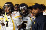 MIAMI GARDENS, FL - JANUARY 04:  Stedman Bailey #3 and Pat Miller #6 of the West Virginia Mountaineers wait in the tunnel prior to running onto the field to take on the Clemson Tigers during the Discover Orange Bowl at Sun Life Stadium on January 4, 2012 in Miami Gardens, Florida.  (Photo by Mike Ehrmann/Getty Images)