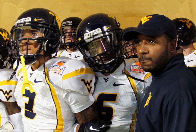 MIAMI GARDENS, FL - JANUARY 04:  Stedman Bailey #3 and Pat Miller #6 of the West Virginia Mountaineers wait in the tunnel prior to running onto the field to take on the Clemson Tigers during the Discover Orange Bowl at Sun Life Stadium on January 4, 2012 in Miami Gardens, Florida.  (Photo by Mike Ehrmann/Getty Images)