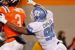 BLACKSBURG, VIRGINIA - NOVEMBER 17:  Quarterback Logan Thomas #3 of the Virginia Tech Hokies is tackled by defensive end Quinton Coples #90 of the North Carolina Tar Heels at Lane Stadium on November 17, 2011 in Blacksburg, Virginia. (Photo by Geoff Burke/Getty Images)