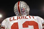 TEMPE, ARIZONA - JANUARY 3:  Tailback Maurice Clarett #13 of the Ohio State Buckeyes takes in the victory over the University of Miami Hurricanes in the Tostitos Fiesta Bowl at Sun Devil Stadium on January 3, 2003 in Tempe, Arizona.  Ohio State won the game 31-24 in double-overtime, winning the NCAA National Championship. (Photo by Brian Bahr/Getty Images)