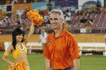 HOUSTON - JUNE 26:  Houston Dynamo President and General Manager Oliver Luck receives some gifts from the Dynamo's Chris Canetti after the game at Robertson Stadium on June 26, 2010 in Houston, Texas. Luck is leaving the Dynamo to take the athletic directors position at West Virginia.  (Photo by Bob Levey/Getty Images)