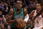 BOSTON, MA - JANUARY 16:  Rajon Rondo #9 of the Boston Celtics heads for the net as Russell Westbrook #0 of the Oklahoma City Thunder defends on January 16, 2012 at TD Garden in Boston, Massachusetts. NOTE TO USER: User expressly acknowledges and agrees that, by downloading and or using this photograph, User is consenting to the terms and conditions of the Getty Images License Agreement.  (Photo by Elsa/Getty Images)