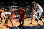 ATLANTA, GA - JANUARY 21:  Josh Smith #5 of the Atlanta Hawks defends as Tracy McGrady #1 strips the ball from Kyrie Irving #2 of the Cleveland Cavaliers at Philips Arena on January 21, 2012 in Atlanta, Georgia.  NOTE TO USER: User expressly acknowledges and agrees that, by downloading and or using this photograph, User is consenting to the terms and conditions of the Getty Images License Agreement.  (Photo by Kevin C. Cox/Getty Images)
