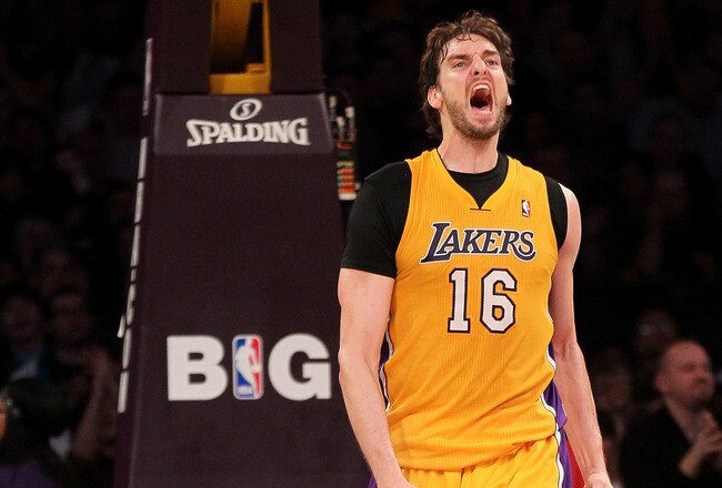 LOS ANGELES, CA - DECEMBER 27:  Pau Gasol #16 of the Los Angeles Lakers celebrates after making a basket in the second quarter against the Utah Jazz at Staples Center on December 27, 2011 in Los Angeles, California.  The Lakers won 96-71.  NOTE TO USER: User expressly acknowledges and agrees that, by downloading and or using this photograph, User is consenting to the terms and conditions of the Getty Images License Agreement.  (Photo by Stephen Dunn/Getty Images)