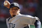 ARLINGTON, TX - SEPTEMBER 24: Starting pitcher Felix Hernandez #34 of the Seattle Mariners throws a pitch during the first inning of a baseball game against the Texas Rangers at Rangers Ballpark in Arlington on September 24, 2011 in Arlington, Texas. (Photo by Brandon Wade/Getty Images)