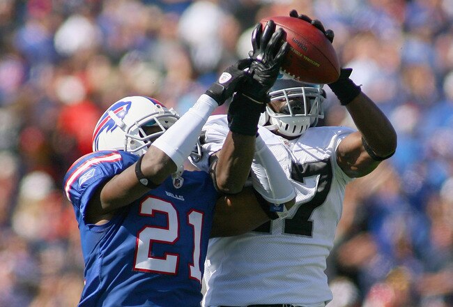 ORCHARD PARK, NY - SEPTEMBER 18:  Denarius Moore #17 of the Oakland Raiders makes a catch against  Leodis McKelvin #21 of the Buffalo Bills at Ralph Wilson Stadium on September 18, 2011 in Orchard Park, New York. Buffalo won 38-35.  (Photo by Rick Stewart/Getty Images)