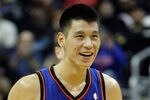 WASHINGTON, DC - FEBRUARY 08:  Jeremy Lin #17 of the New York Knicks smiles after scoring against the Washington Wizards during the second half at Verizon Center on February 8, 2012 in Washington, DC.   NOTE TO USER: User expressly acknowledges and agrees that, by downloading and or using this photograph, User is consenting to the terms and conditions of the Getty Images License Agreement.  (Photo by Rob Carr/Getty Images)