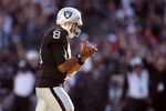 OAKLAND, CA - OCTOBER 31:  Jason Campbell #8 of the Oakland Raiders claps his hands after the Raiders scored their last touchdown against the Seattle Seahawks at Oakland-Alameda County Coliseum on October 31, 2010 in Oakland, California.  (Photo by Ezra Shaw/Getty Images)