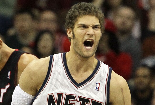 NEWARK, NJ - APRIL 03:  Brook Lopez #11 of the New Jersey Nets reacts against the Miami Heat at the Prudential Center on April 3, 2011 in Newark, New Jersey.The Heat defeated the Nets 108-94.NOTE TO USER: User expressly acknowledges and agrees that, by downloading and/or using this Photograph, user is consenting to the terms and conditions of the Getty Images License Agreement.  (Photo by Jim McIsaac/Getty Images)
