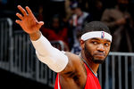 ATLANTA, GA - JANUARY 16:  Josh Smith #5 of the Atlanta Hawks reacts after their 93-84 win over the Toronto Raptors at Philips Arena on January 16, 2012 in Atlanta, Georgia.  NOTE TO USER: User expressly acknowledges and agrees that, by downloading and or using this photograph, User is consenting to the terms and conditions of the Getty Images License Agreement.  (Photo by Kevin C. Cox/Getty Images)