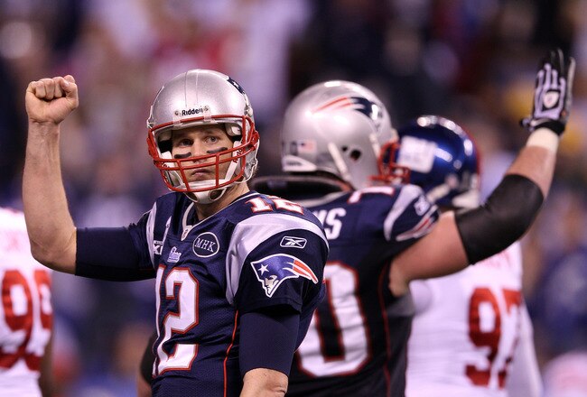 INDIANAPOLIS, IN - FEBRUARY 05:  Quarterback Tom Brady #12 of the New England Patriots reacts during the game against the New York Giants during Super Bowl XLVI at Lucas Oil Stadium on February 5, 2012 in Indianapolis, Indiana.  (Photo by Elsa/Getty Images)