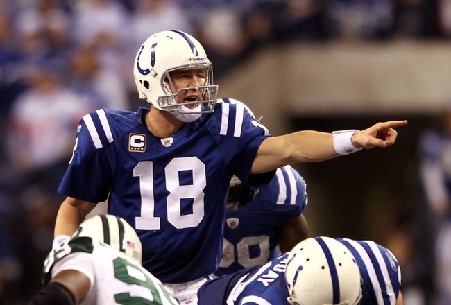 INDIANAPOLIS - JANUARY 24:  Quarterback Peyton Manning #18 of the Indianapolis Colts under center during the second half against the New York Jets during the AFC Championship Game at Lucas Oil Stadium on January 24, 2010 in Indianapolis, Indiana. The Colts defeated the Jets 30-17.  (Photo by Elsa/Getty Images)