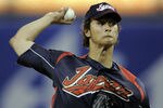 SAN DIEGO - MARCH 17:  Yu Darvish #11 of Japan pitches against Korea during the 2009 World Baseball Classic Round 2 Pool 1 Game 4 on March 17, 2009 at Petco Park in San Diego, California.  (Photo by Kevork Djansezian/Getty Images)