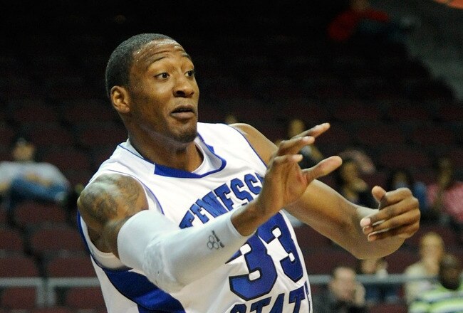 LAS VEGAS, NV - NOVEMBER 25:  Robert Covington #33 of the Tennessee State Tigers tries to keep the ball in bounds against the Mississippi Valley State Delta Devils during the third round of the Continental Tire Las Vegas Invitational at the Orleans Arena November 25, 2011 in Las Vegas, Nevada. Mississippi Valley State won 90-89 in double overtime.  (Photo by Ethan Miller/Getty Images)
