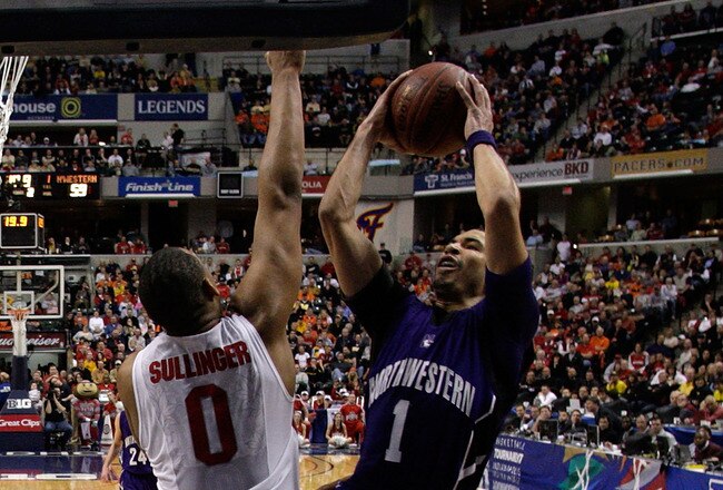 INDIANAPOLIS, IN - MARCH 11:  Drew Crawford #1 of the Northwestern Wildcats attempts a shot against Jared Sullinger #0 of the Ohio State Buckeyes during the quarterfinals of the 2011 Big Ten Men's Basketball Tournament at Conseco Fieldhouse on March 11, 2011 in Indianapolis, Indiana. Ohio State won 67-61 in overtime. (Photo by Andy Lyons/Getty Images)
