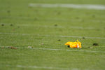 DENVER, CO - SEPTEMBER 12:  A penalty flag lies on the turf during the game between the Oakland Raiders and the Denver Broncos at Sports Authority Field at Mile High on September 12, 2011 in Denver, Colorado.  (Photo by Garrett W. Ellwood/Getty Images)