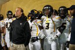MIAMI GARDENS, FL - JANUARY 04:  (L-R) Head coach Dana Holgorsen, Tavon Austin #1 and Stedman Bailey #3 of the West Virginia Mountaineers wait in the tunnel prior to running onto the field to take on the Clemson Tigers during the Discover Orange Bowl at Sun Life Stadium on January 4, 2012 in Miami Gardens, Florida.  (Photo by Mike Ehrmann/Getty Images)