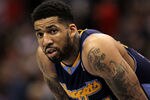 LOS ANGELES, CA - MARCH 5:   Wilson Chandler #21 of the Denver Nuggets waits in the game against the Los Angeles Clippers at Staples Center on March 5, 2011 in Los Angeles, California.  NOTE TO USER: User expressly acknowledges and agrees that, by downloading and or using this photograph, User is consenting to the terms and conditions of the Getty Images License Agreement. (Photo by Stephen Dunn/Getty Images)